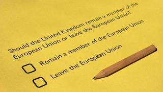 Close-up of a pen a checkbox
