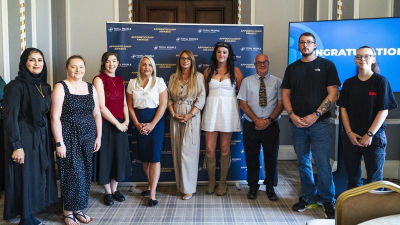 The Apprentice of the Year 2026 nominees stand in a line, with Total People Managing Director, Melanie Nicholson, in the middle.