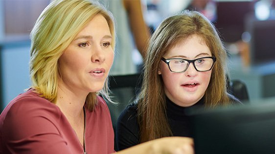 A tutor talking to an student