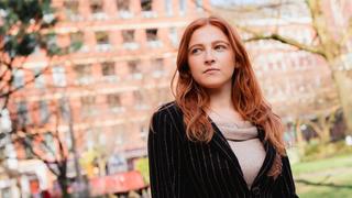 A Professional Services apprentice looks to the future with steely determination.