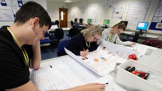 Group of students working in a classroom