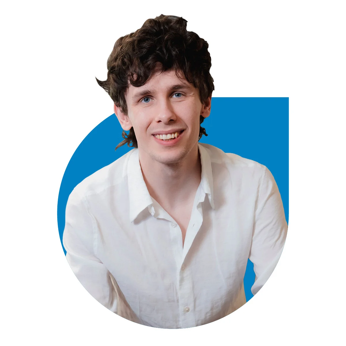 Image of a man sat with blue background