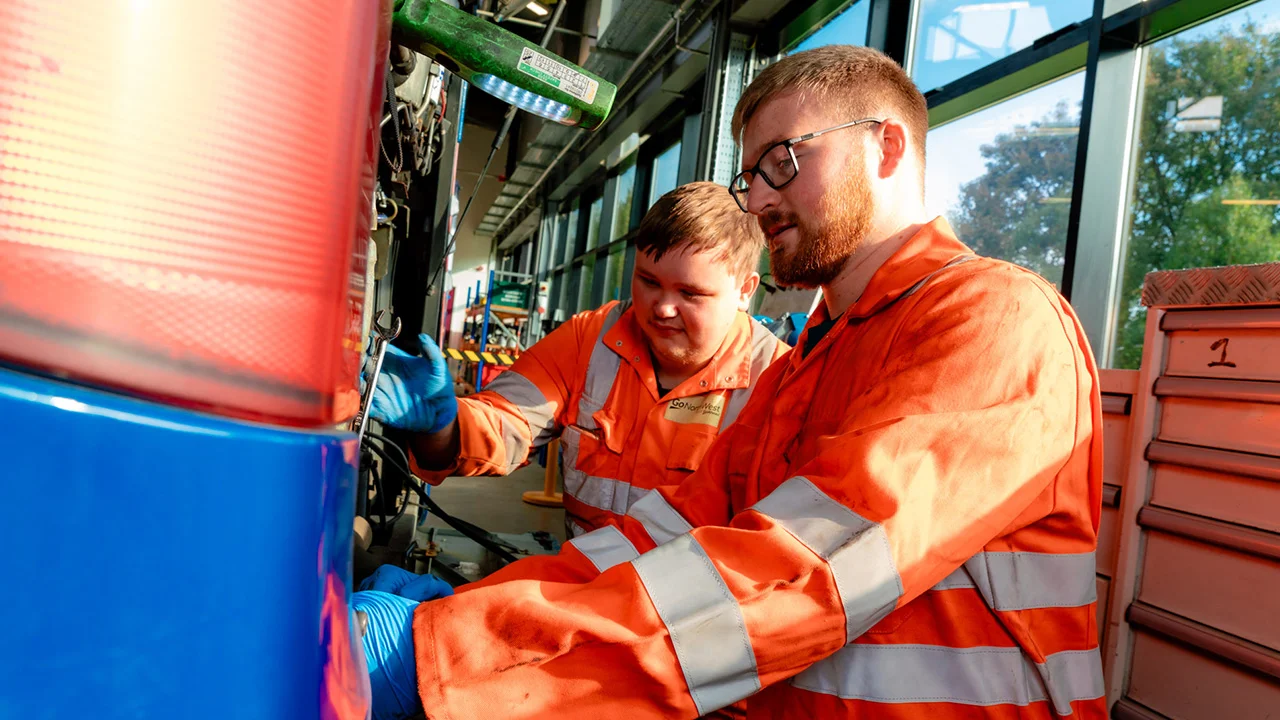 A Bus and Coach apprentice in a vehicle
