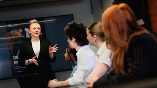 Colleagues gathered together for a meeting