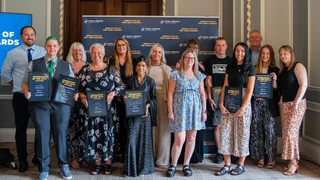 All of the winners of the Apprentice of the Month awards, along with Melanie Nicholson and John Thornhill.