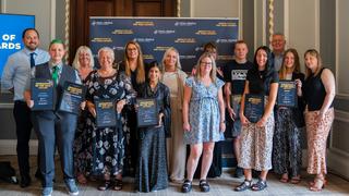 All of the winners of the Apprentice of the Month awards, along with Melanie Nicholson and John Thornhill.