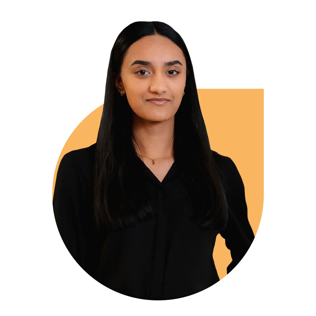 A woman standing in a black office shirt