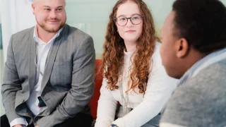 Group of colleagues looking at each other