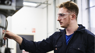 Apprentice doing practical work