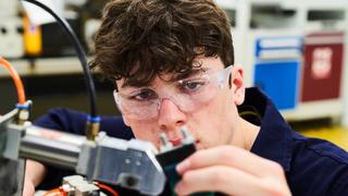young male adult working with electrics