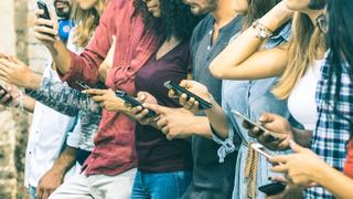 Group of people all on their phones