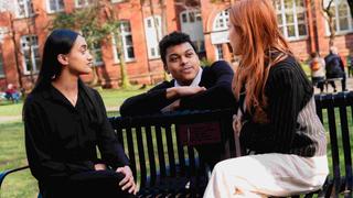 people sitting in a parl chatting