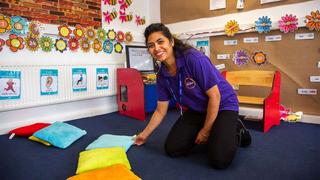 An apprentice at a nursery.