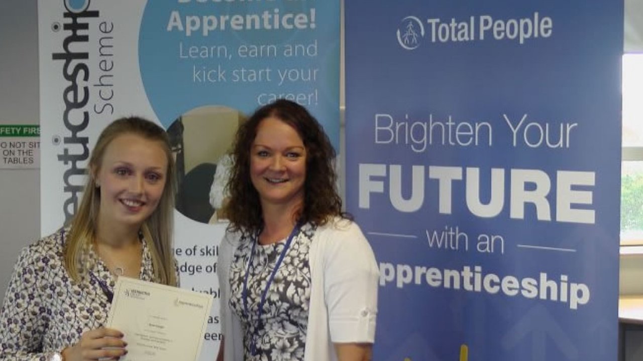 Amie Hough receiving her Business Administration Apprenticeship Certificate