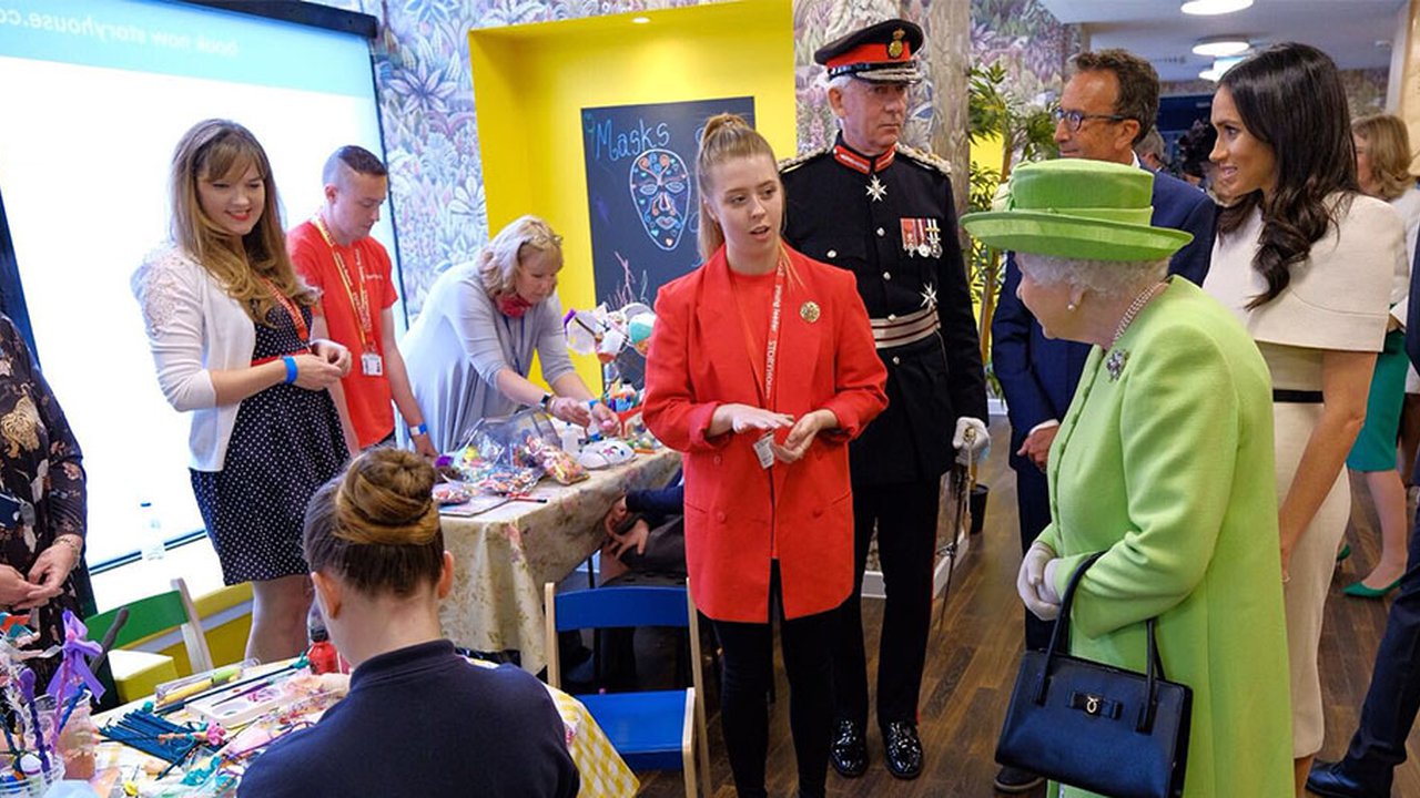 Queen Elizabeth II and the Duchess of Sussex meet learners