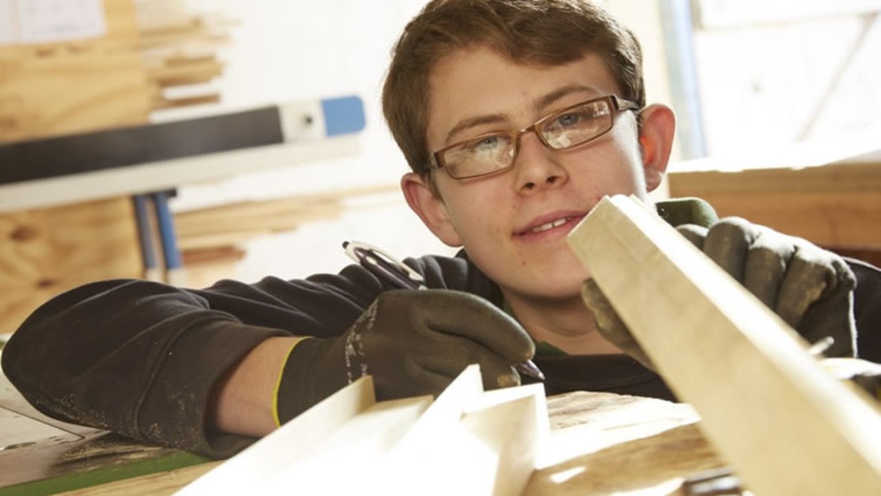 Young boy writing