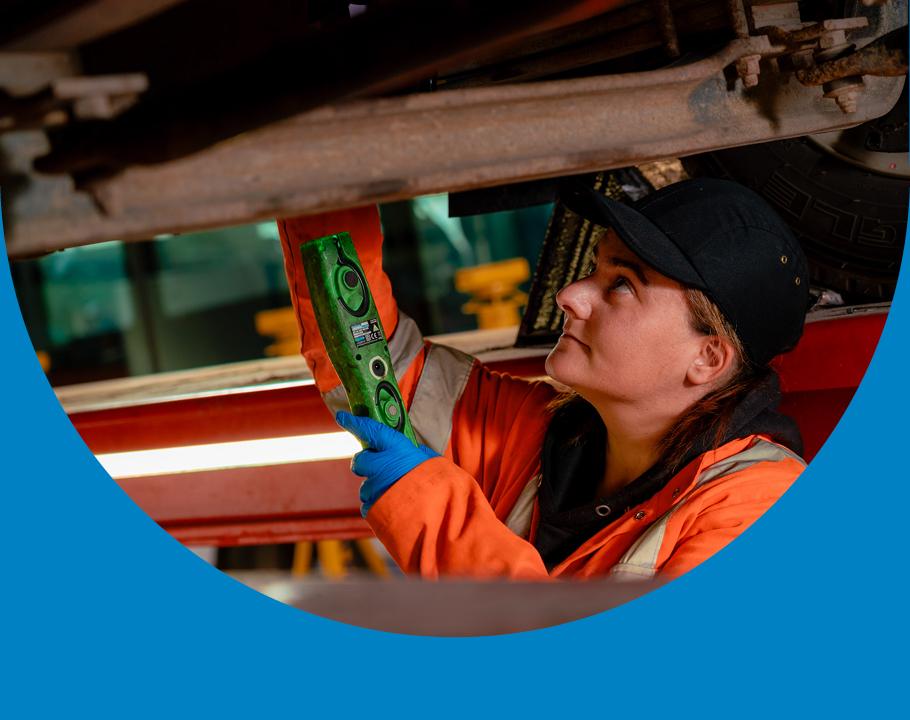 A woman working on a bus