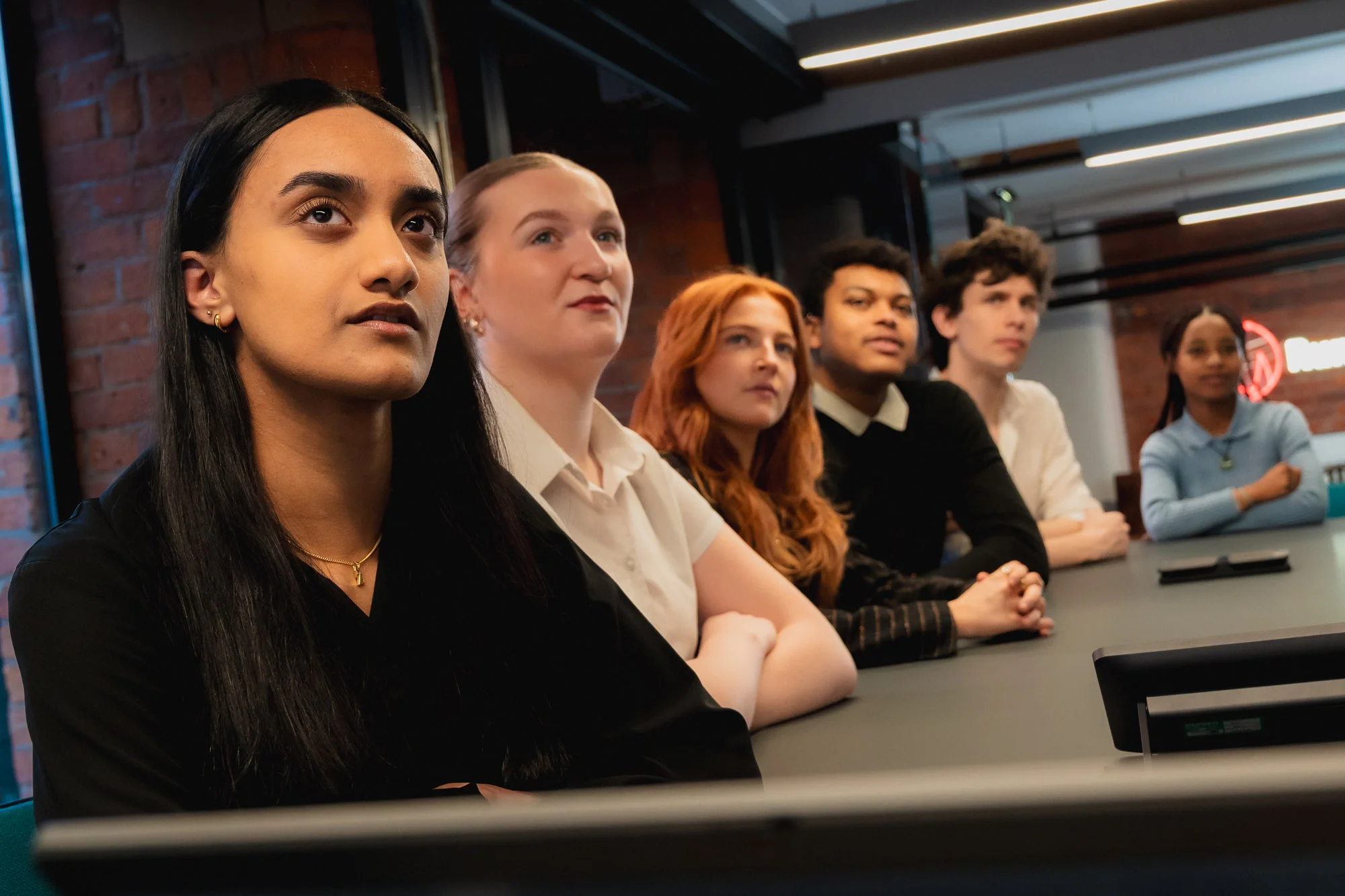 A group of employees during a meeting