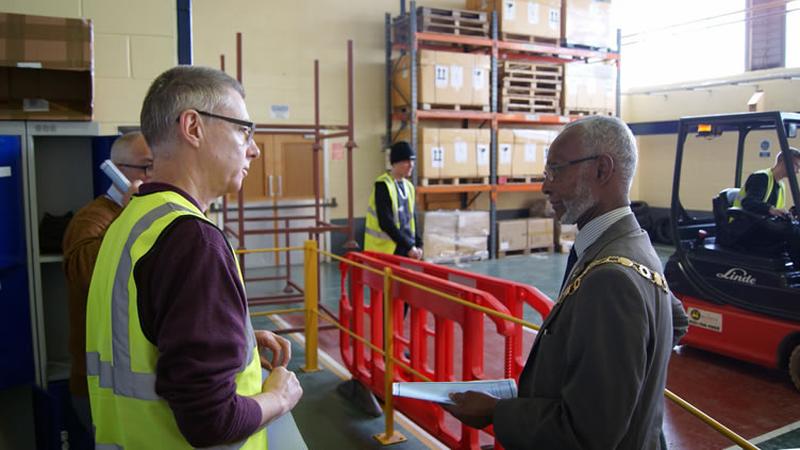 Councillor Leon Murray talking to a tutor