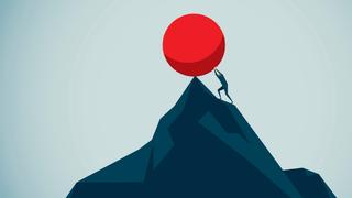 Someone pushing a large ball to the top of a mountain